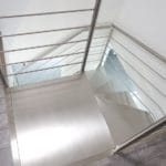 Escalier double quart tournant limon inox brossé