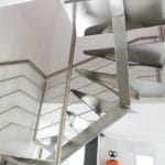 Escalier double quart tournant limon inox brossé